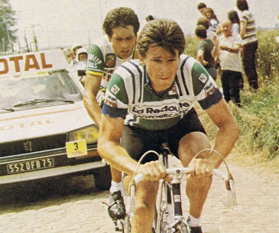 Paul Sherwen in his La Redoute kit on the cobbles