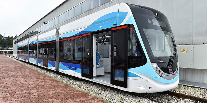 Nová tramvaj pro turecké město İzmir.
Normal
0
21
false
false
false
CS
X-NONE
X-NONE
/* Style Definitions */
table.MsoNormalTable
{mso-style-name:"Normální tabulka";
mso-tstyle-rowband-size:0;
mso-tstyle-colband-size:0;
mso-style-noshow:yes;
mso-style-priority:99;
mso-style-parent:"";
mso-padding-alt:0cm 5.4pt 0cm 5.4pt;
mso-para-margin:0cm;
mso-para-margin-bottom:.0001pt;
text-align:justify;
mso-pagination:widow-orphan;
font-size:11.0pt;
font-family:"Calibri","sans-serif";
mso-ascii-font-family:Calibri;
mso-ascii-theme-font:minor-latin;
mso-hansi-font-family:Calibri;
mso-hansi-theme-font:minor-latin;
mso-fareast-language:EN-US;}
(zdroj: https://railturkey.org/)