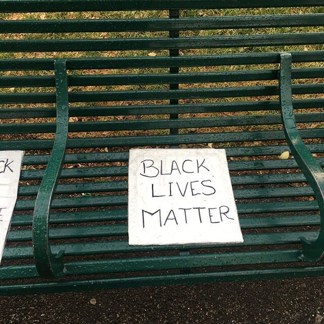 #kenningtonpark A bench with soaked poignant signs. It seems particularly unfair that we have been locked in for lockdown and now we want to get out and express outrage the deluge has come.