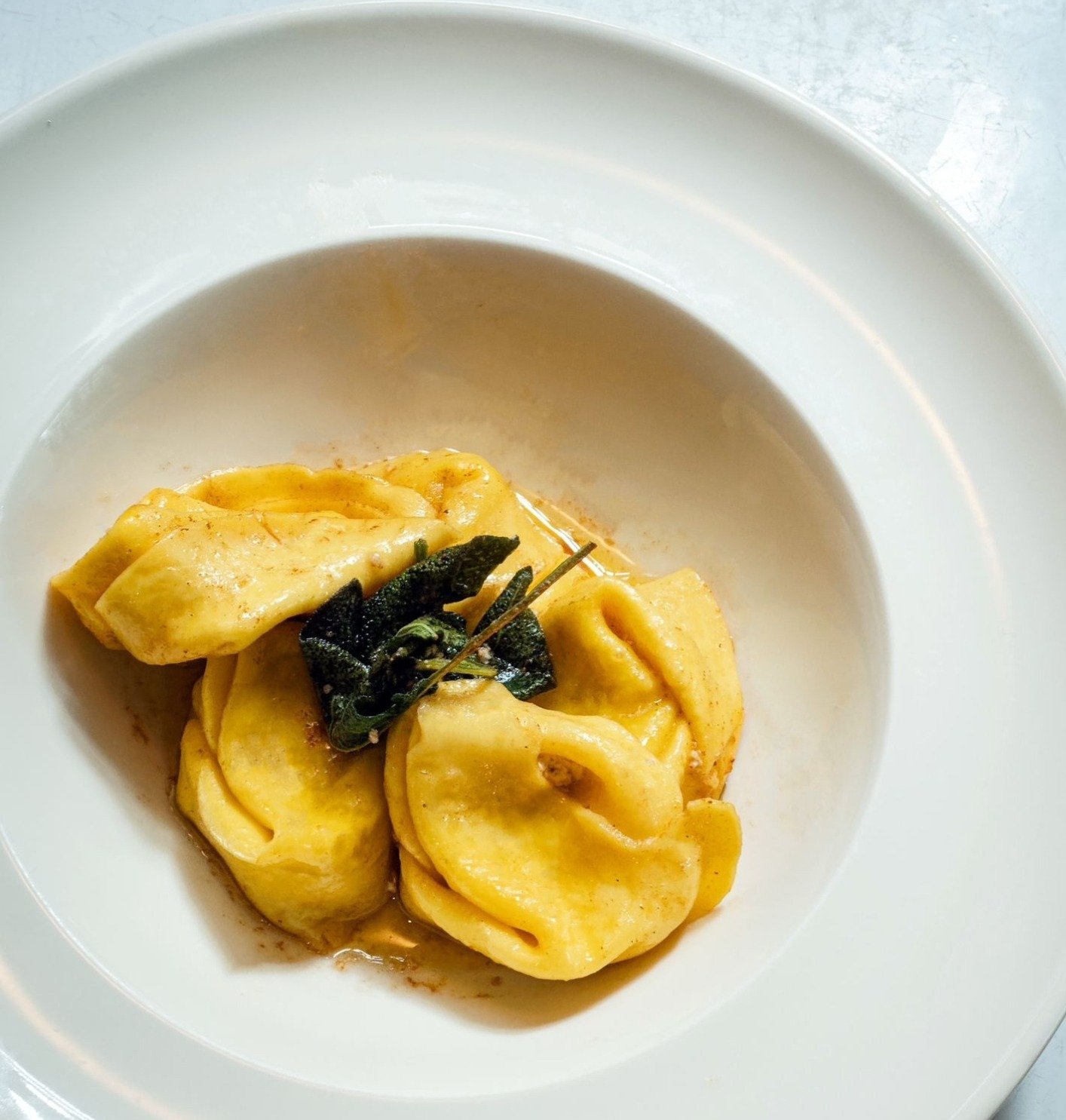 Dining at Bottega is an existential crisis on a plate &ndash; deliciously absurd and absurdly delicious❤️

Homemade ravioloni ricotta and spinach with butter and sage.