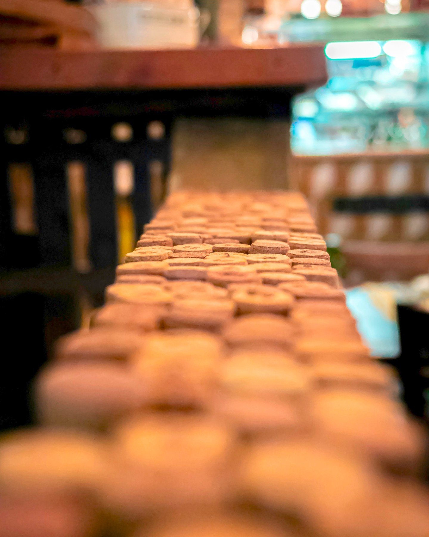 This wonderful line of corks you can find at the entrance of our restaurant, represents about 80 bottles of wine! 🍷

That's 
-320 glasses
-512 stories told
-632 deep laughs
-220 hugs
-458 snort-laughs,
-700 'cin cin',
-573 purple smiles in pictures
