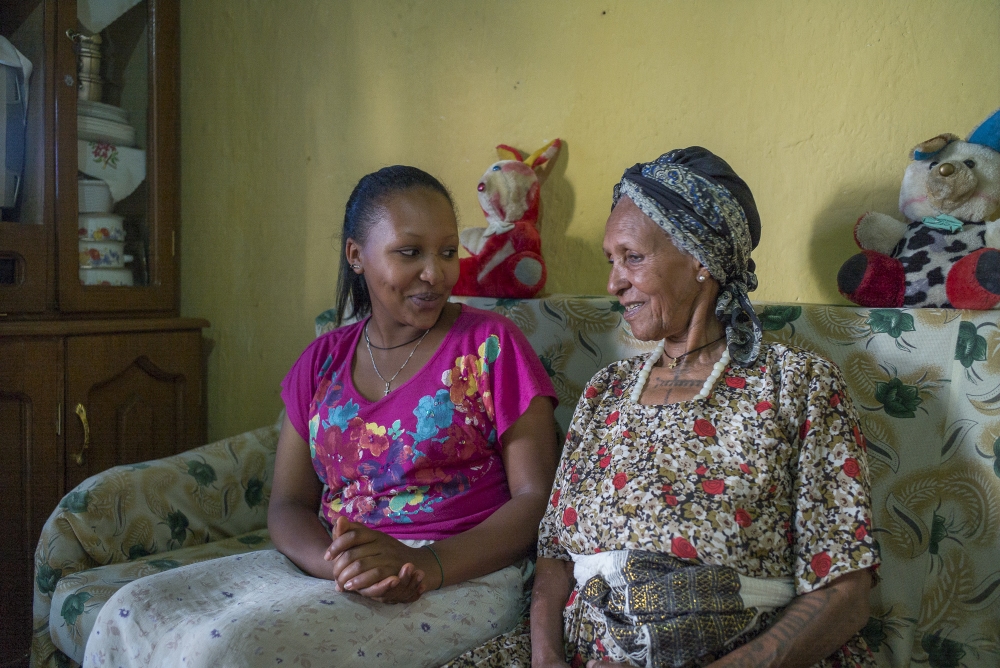 Photo by Daniel Reiter Mihret and her guardian Kutaye, who took care of Mhiret after she lost her parents, Kutaye works brewing and selling local drinks in her small business. Mihret will soon earn her diploma in Accounting and hopes to help Kutaye more when she graduates.