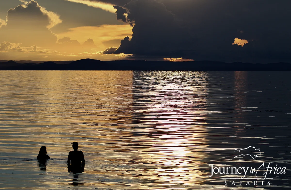 Dip in Lake Tanganyika, after a trek to see the chimps. Photo taken by Julien Polet, the manager of Greystoke Mahale at the time.