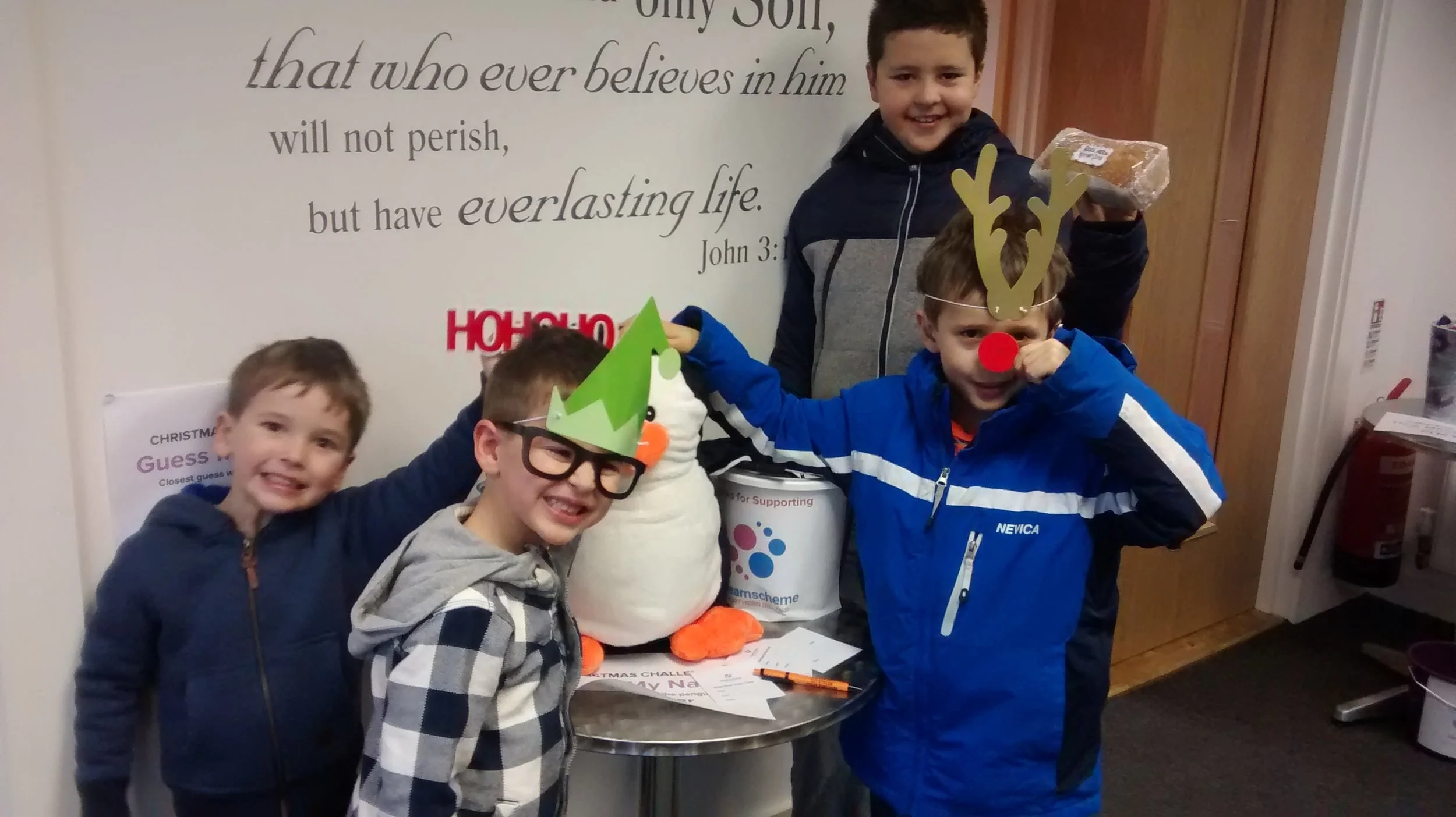 Some young visitors with Frosty the Penguin!