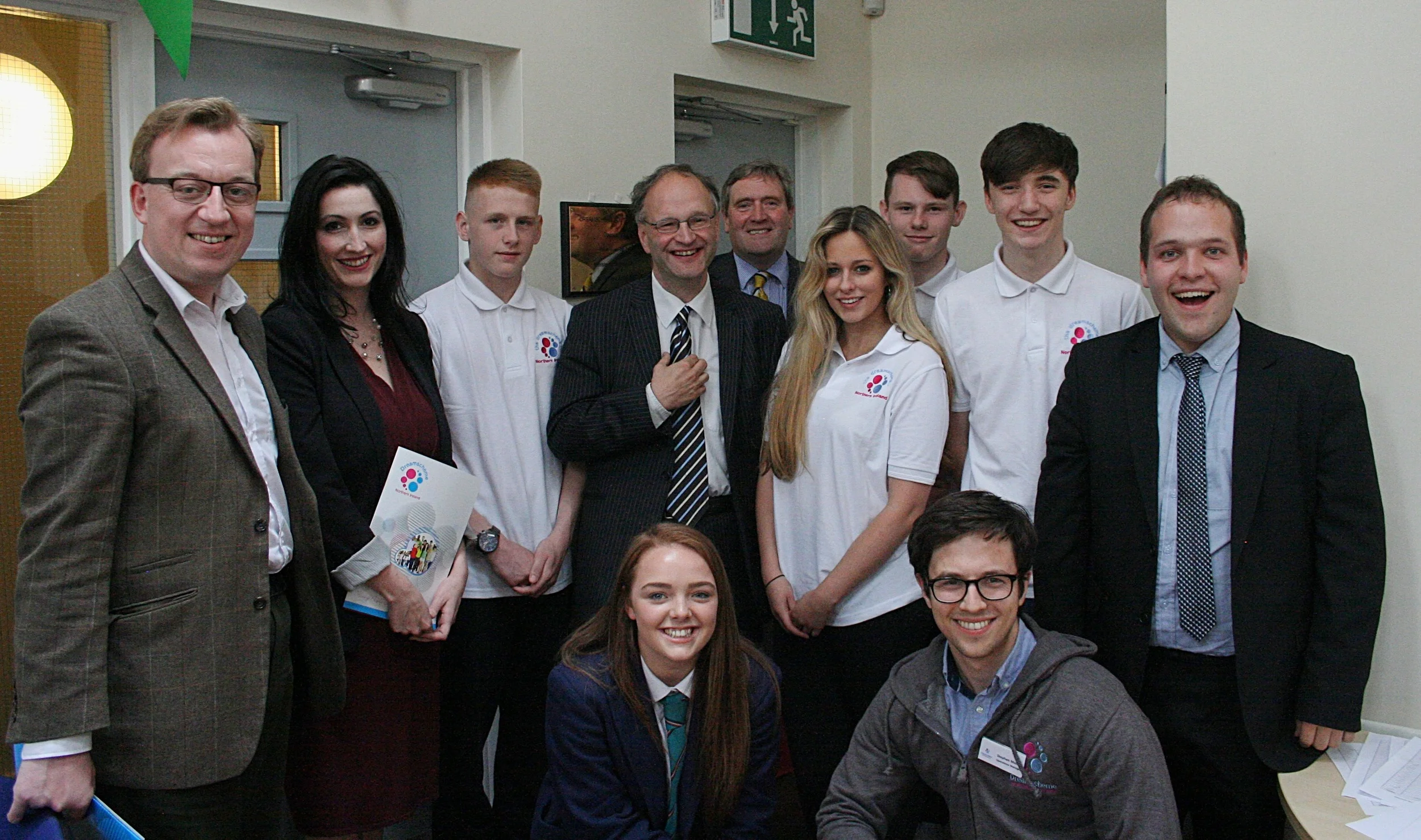 Peter Weir, Minister for Education, and David Nicholl, Dreamscheme Chairman, with group of local representatives and young people at the official opening of the new youth centre (Photo by Sarah Ellis)