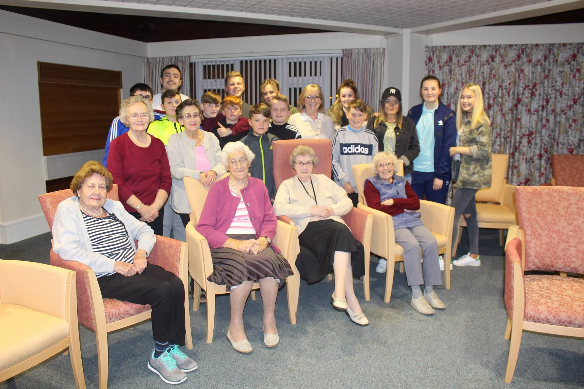Young people with elderly residents from Taylor Court sheltered home in Belvoir