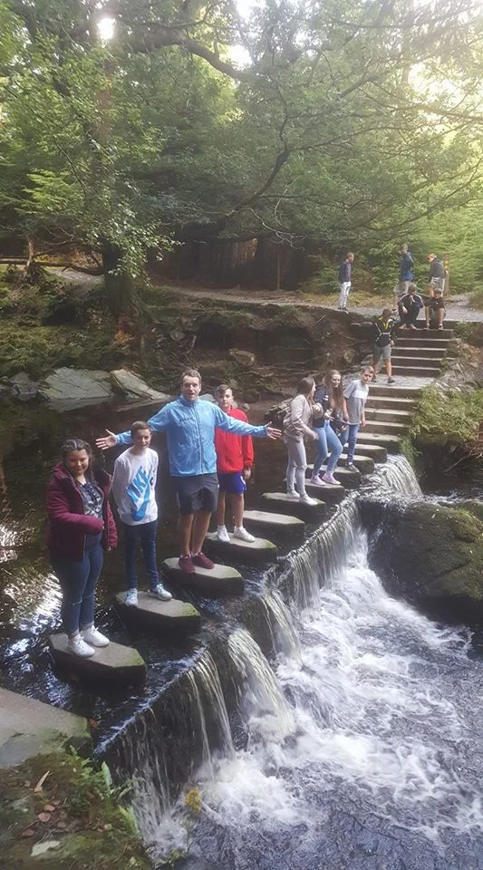 August - What better way to wake up during our summer residential than a trek through Tollymore Forest?
