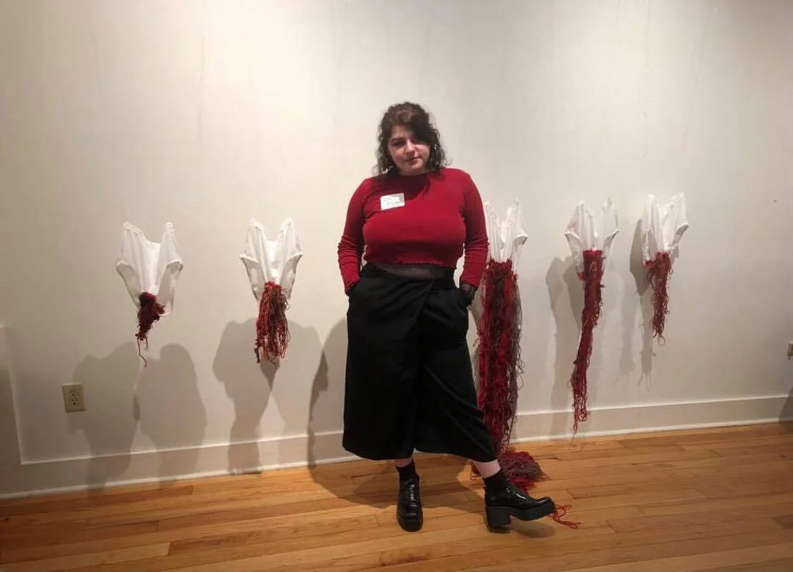 Ilie standing next to her piece Nov. 22 - 27