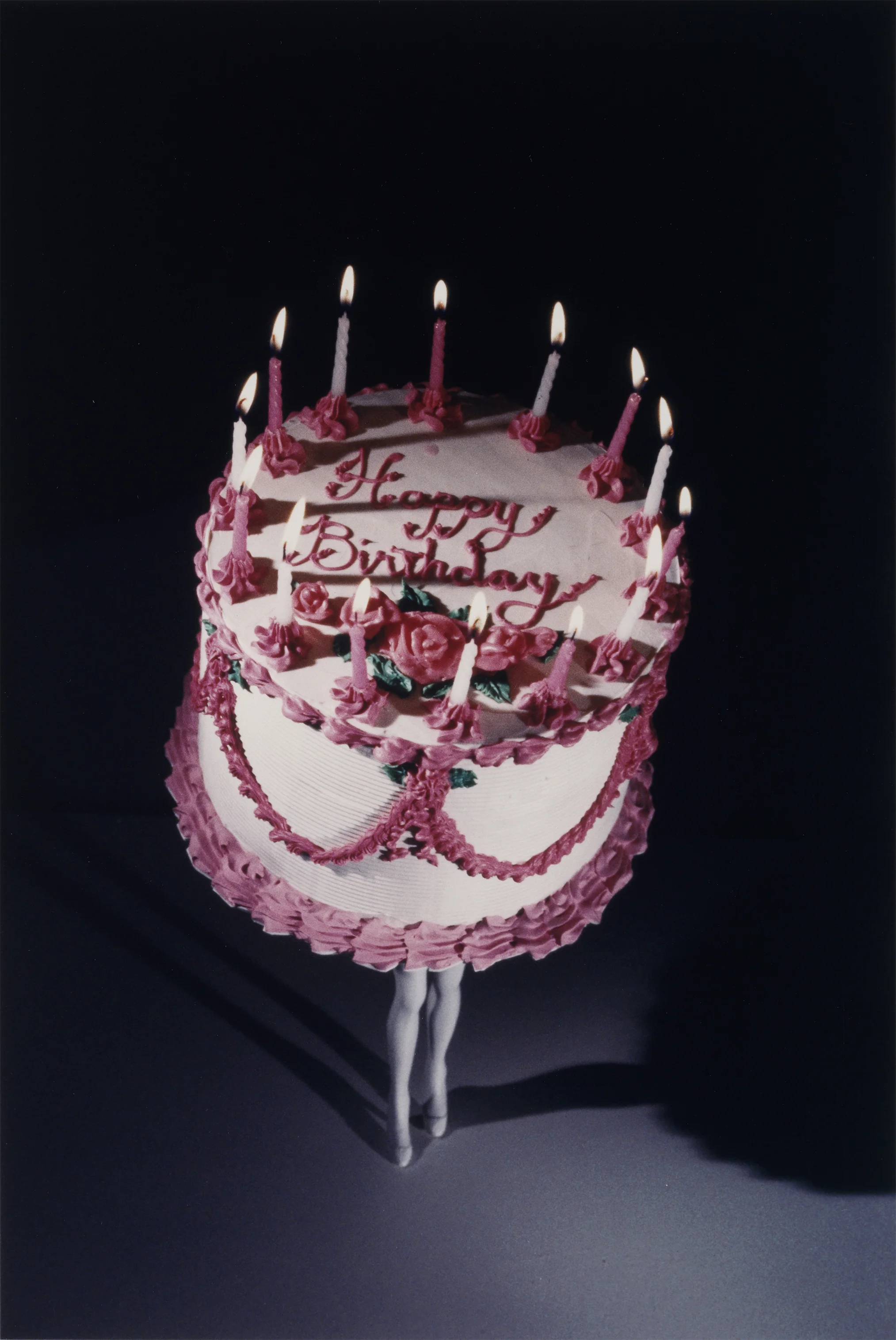 Laurie Simmons, Walking Cake II, 1989, Cibachrome print, 11 3/4 x 7 7/8 inches, Tang Teaching Museum collection, gift of Eileen and Michael Cohen, 2018.1.17
