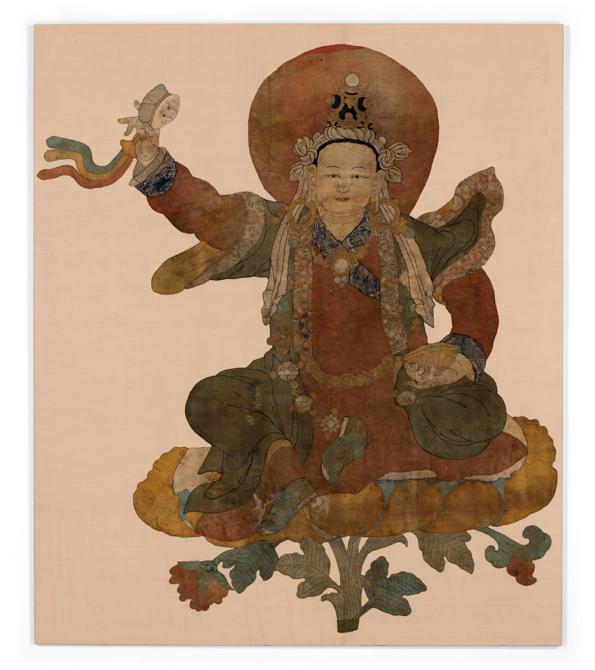 Padmasambhava as Loden Choksé, Tibet, 17th century, silk appliqué, 84 1/8 x 71 5/8 inches, image courtesy Rubin Museum of Art