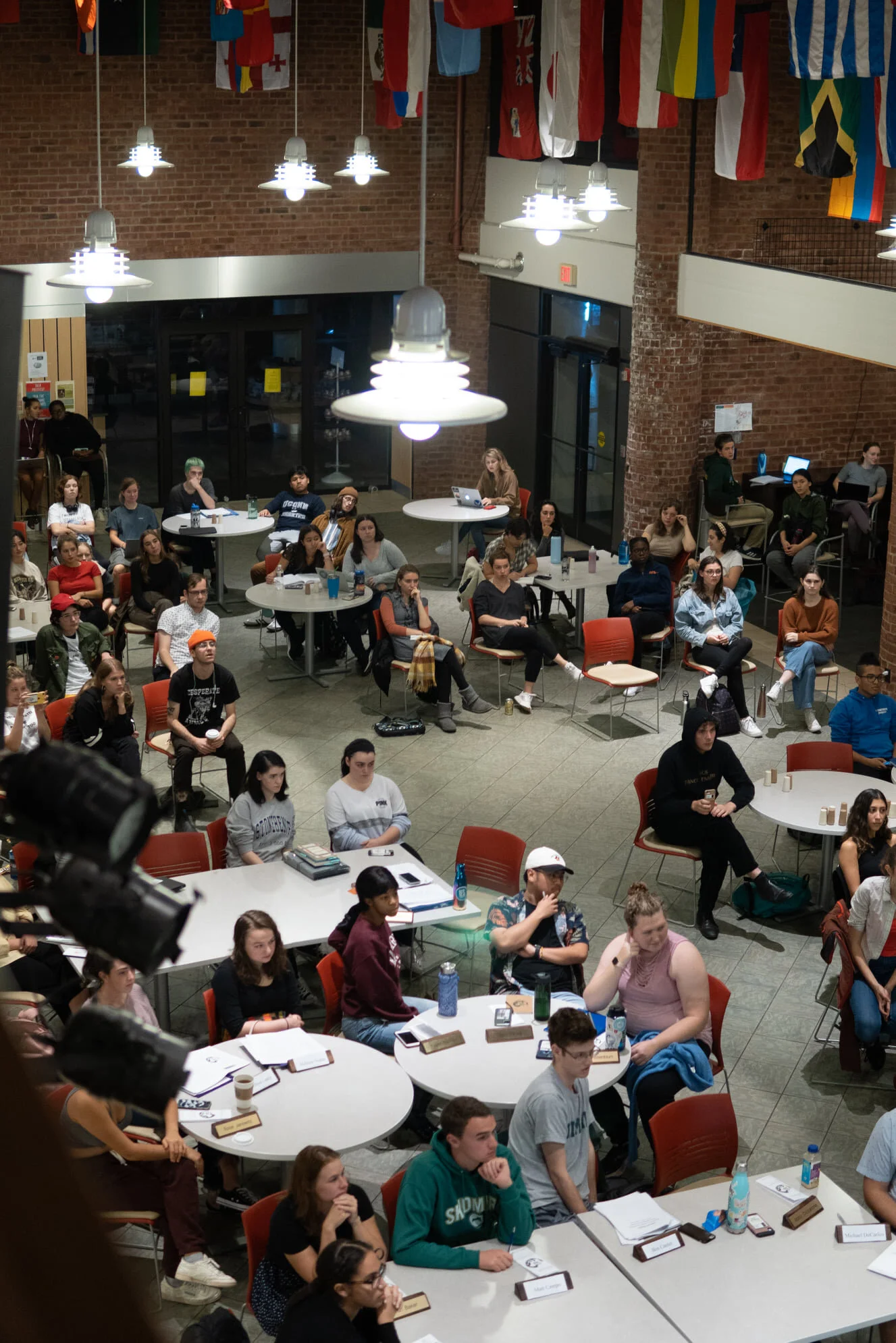 Students listening to the presentation regarding minimum wage at the senate meeting, credits to Peter Sigward
