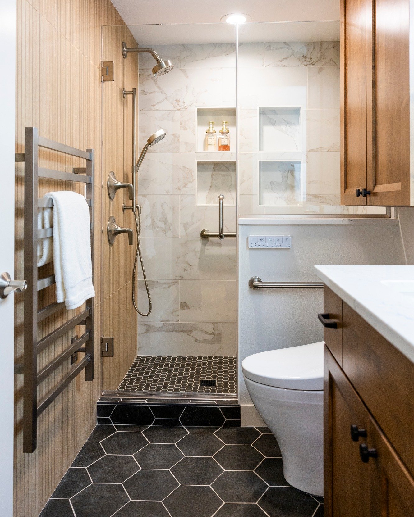 Comfort was the priority, but elevated materials and tailored details make this guest bath feel anything but ordinary.

Designed to support safe, stress-free holiday visits for parents&mdash;beautifully. 🎄

Interior Design | Madison WI | Bathroom De