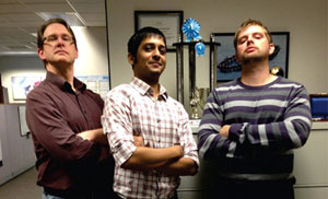Roger Boissonnas strikes a pose with his team, Shankar Lakshmanan, a GeoDecisions developer based in Madison, Wisconsin, and Patrick Empey, a GIS planning specialist with the city of Madison, after winning the GeoDecisions 2014 Hack-a-thon with EasyAsset.