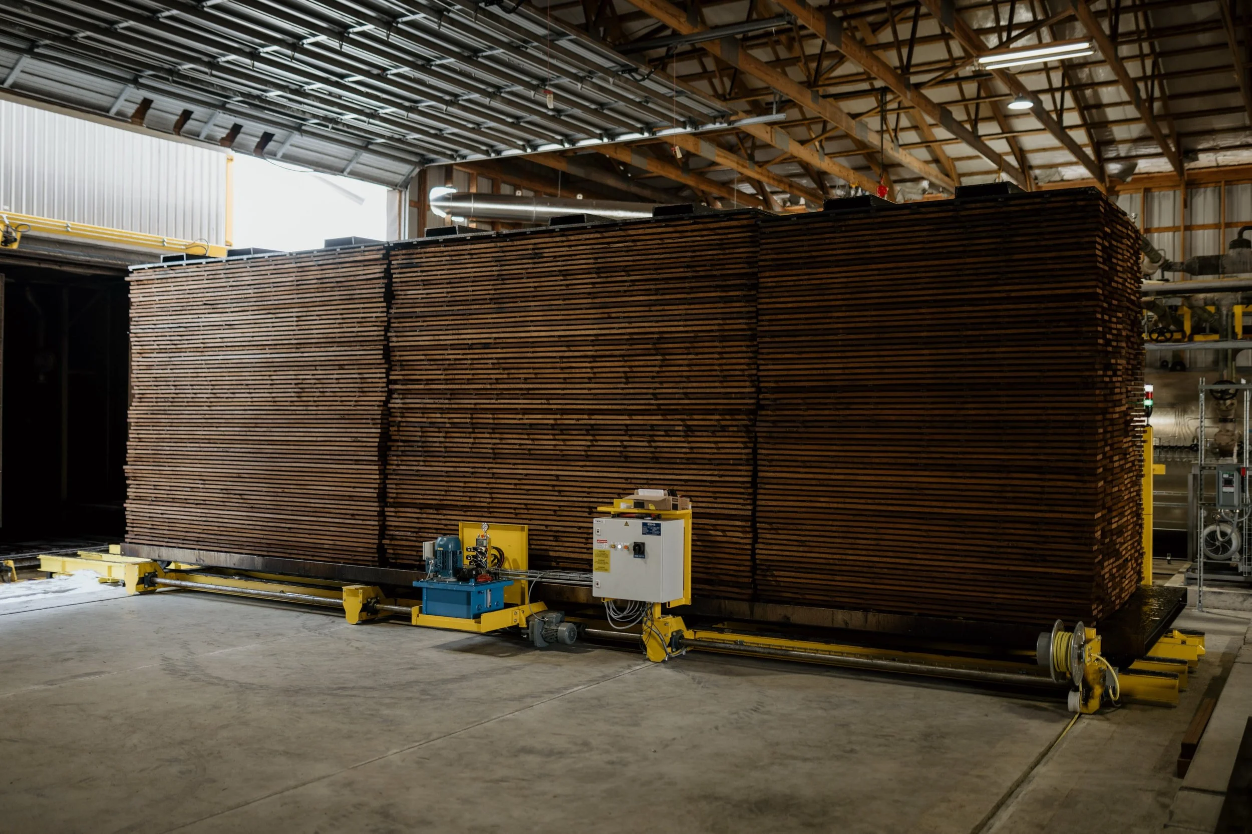 Every board has a story.

Before it becomes a beautiful fa&ccedil;ade, deck, or sauna, it begins here &mdash; our Thermowood&reg; process uses heat and steam to transform sustainably harvested wood into materials engineered for exceptional performanc