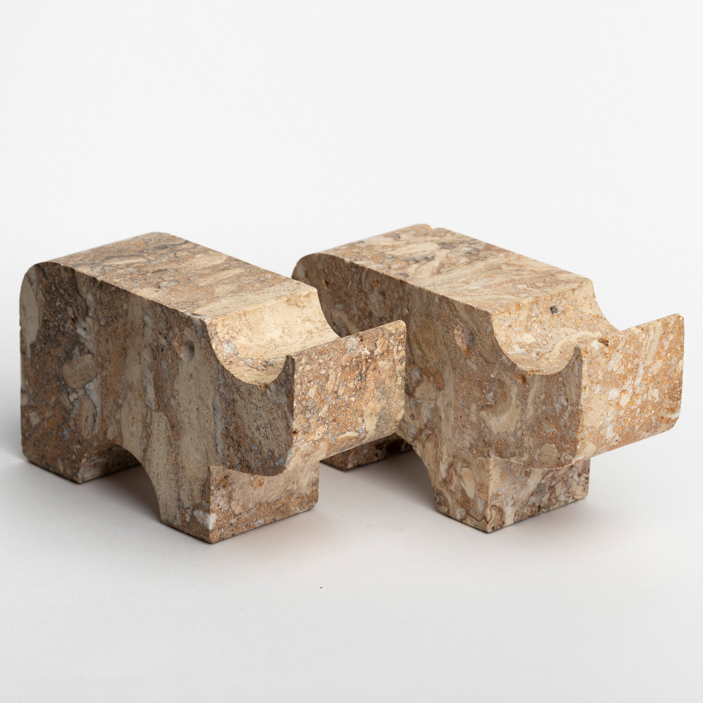 Fratelli Travertine Rhinoceros Bookends.jpg