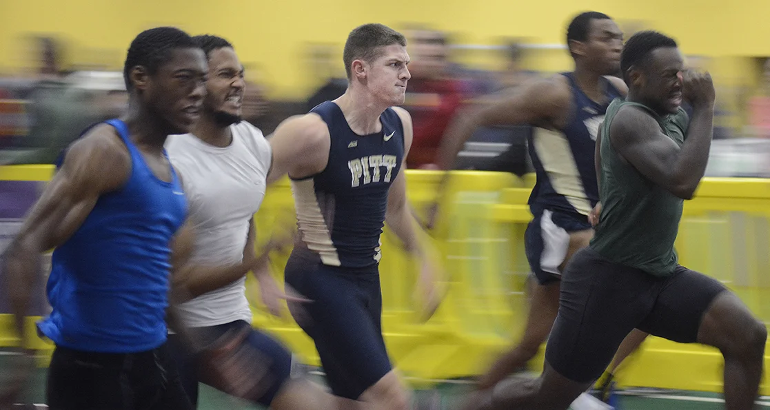 University of Pittsburgh sophomore sprinter Chris Spadaro competes in the 60m dash at the Golden Flash Gala indoor track meet on Dec. 6, 2014. Despite being primarily a long jumper and high jumper, Spadaro finished the 60m dash with a time of 7.25 seconds.