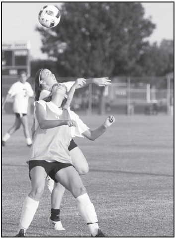 Cara Zwilling, Melissa Carey in a scrimmage.
