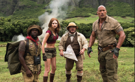 Kevin Hart (left), Karen Gillan, Jack Blackand Dwayne Johnson in "Jumanji" remake.