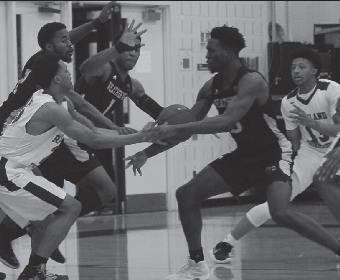Barrington Hunter tussles for the ball against Weatherford players during the game on Jan. 9.
