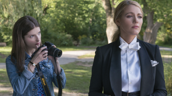 Anna Kendrick, left, photographs Blake Lively in “A Simple Favor.”
