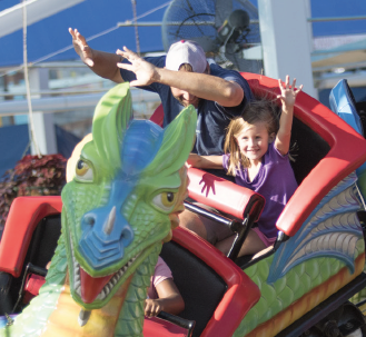 Fairgoers enjoy a ride during opening day of the State Fair of Texas on Sept. 28.