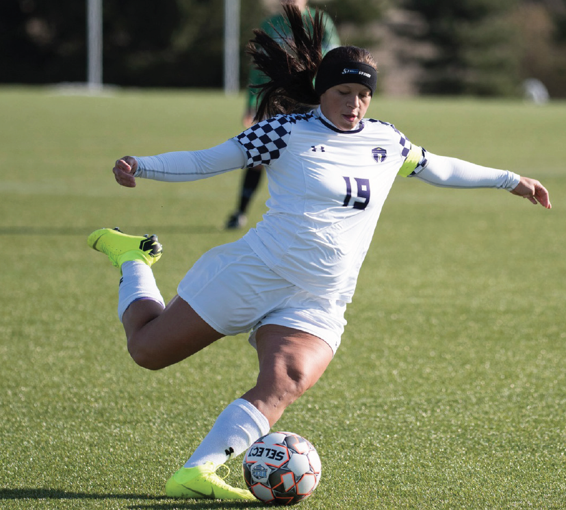 Asia Revely strikes the ball against Delta College at Wedgbury Stadium in Loves Park, Ill., Nov. 11. Richland won the championship game 1-0.