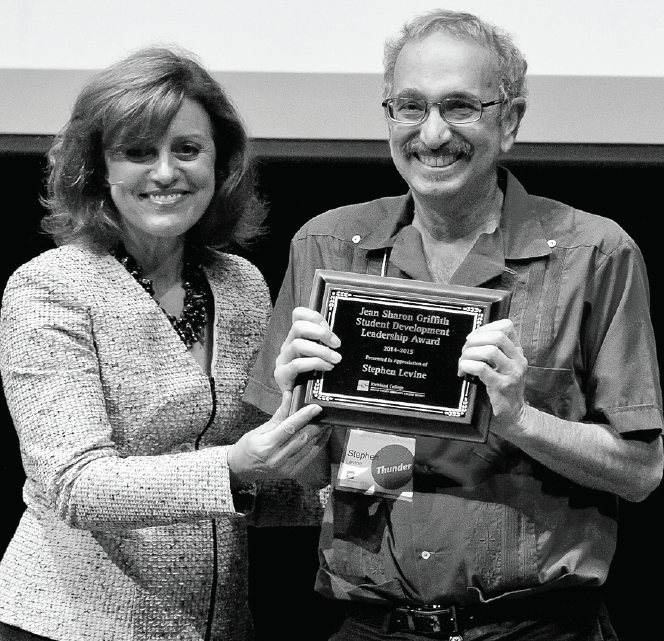 Richland President, Dr. Kay Eggleston, left, presents the Jean Sharon Griffith Student Development Leadership Award to Stephen Levine in 2014.