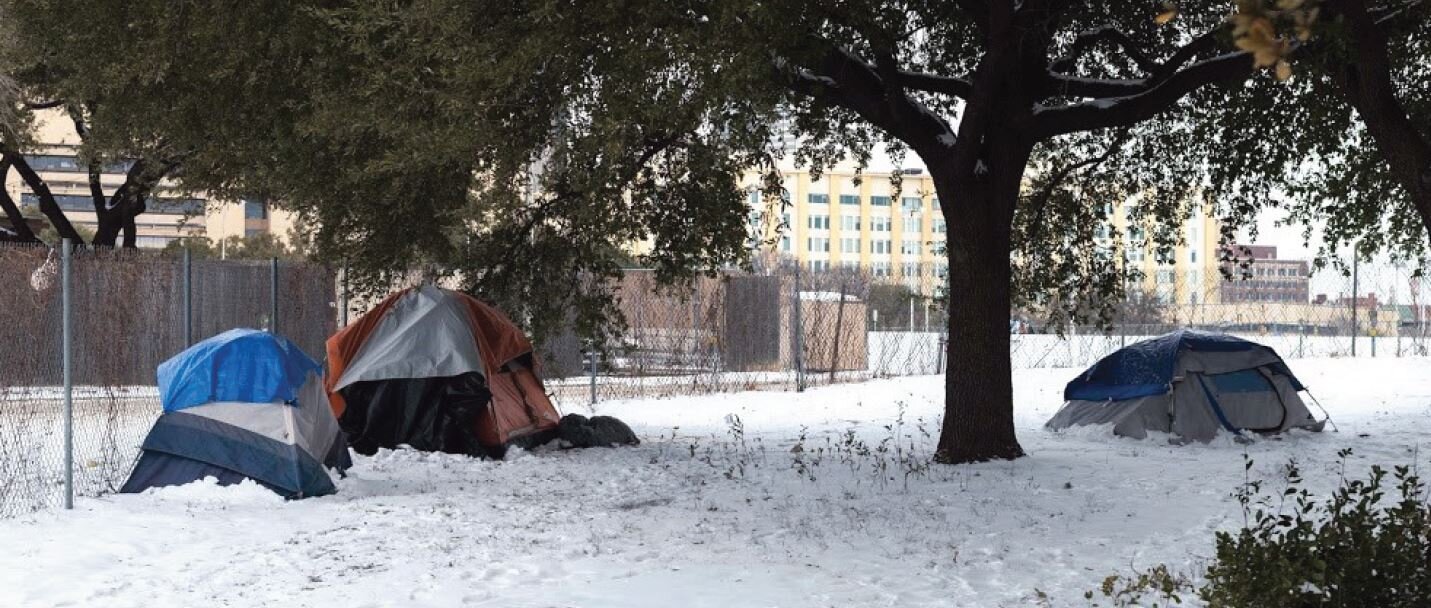 The homeless were especially vulnerable to the cold temperatures as shown here at Camp Rhonda in South Dallas along I-45.