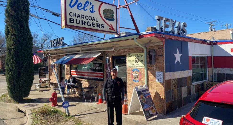 Owner Hossein “Hoss” Taherzadeh in front of the Richardson-famous burger joint.  Photo credit: Aiden Biddle