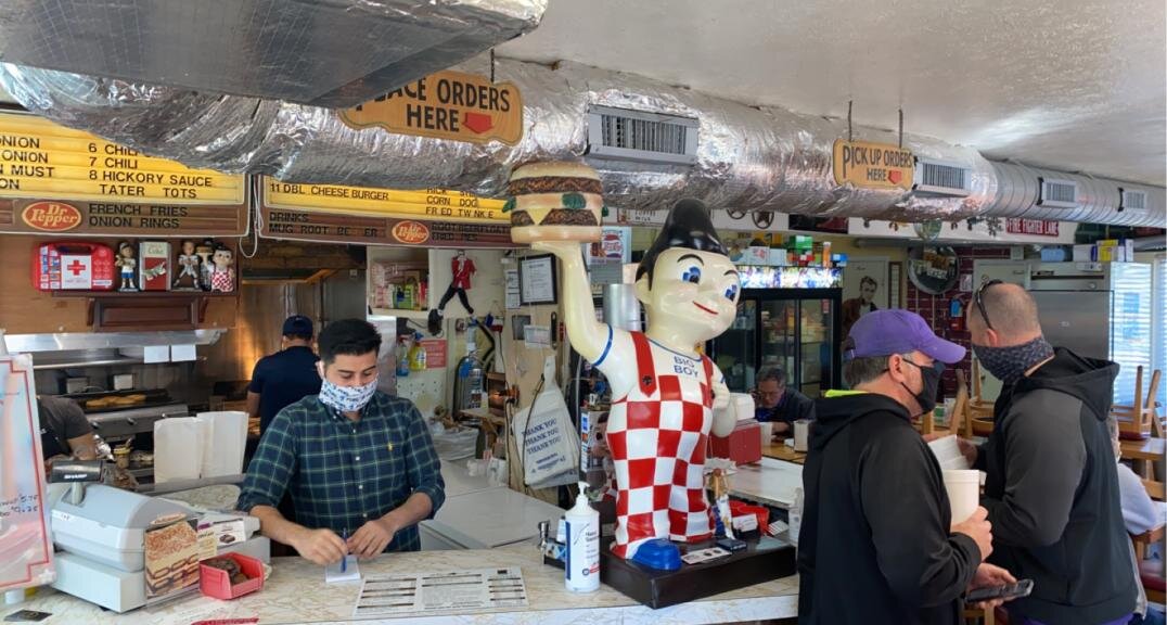 A figurine of world-famous Bob’s Big Boy greets customers at the front counter of Del’s Charcoal Burgers, which has been in business for 64 years in Richardson.   Photo credit: Aiden Biddle