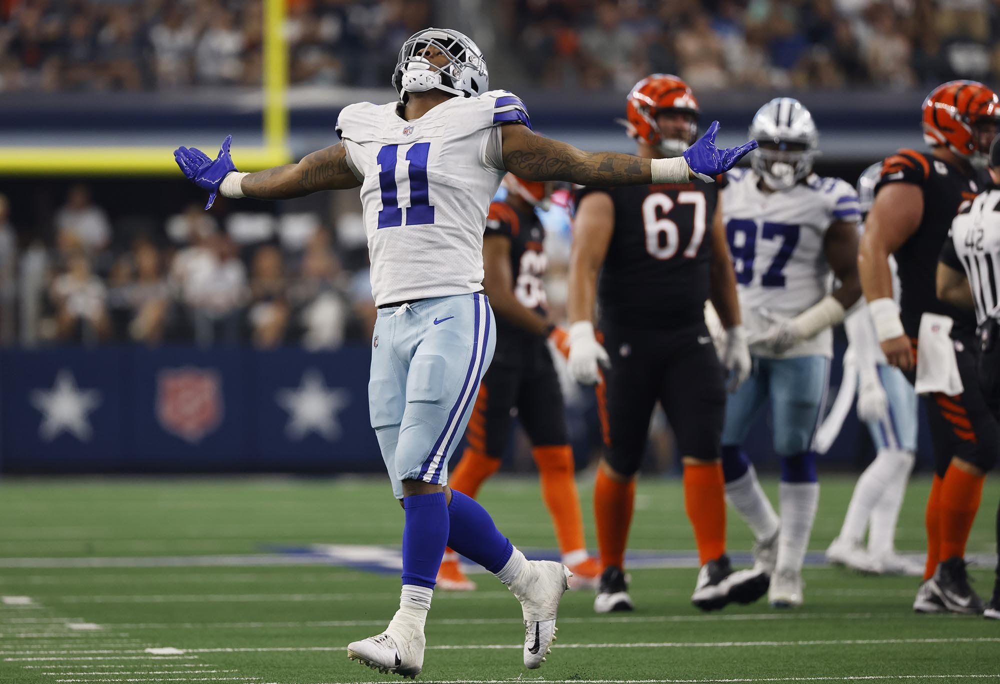 Dallas Cowboys linebacker Micah Parsons celebrates sacking Cincinnati Bengals quarterback Joe Burrow during their game on Sept. 18, 2022, in Arlington, Texas.