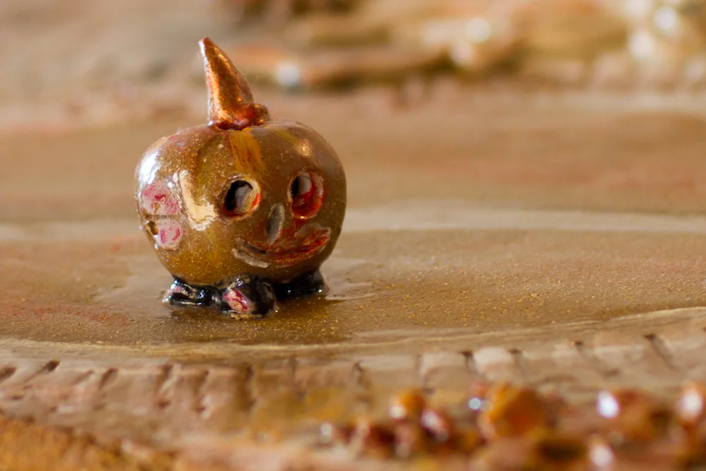 detail of pumpkin car on the road