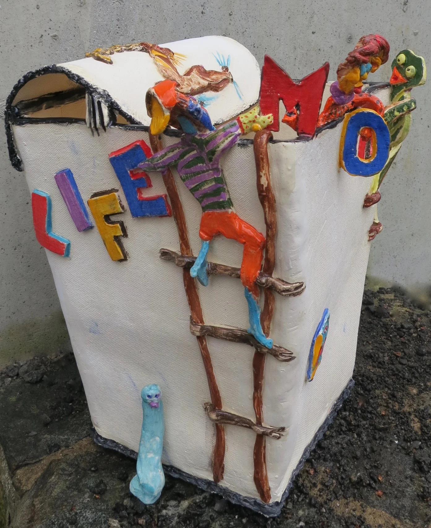 Modern Times, a one foot ceramic garbage pail and pals, with it’s spirit outside(made by my grandson)