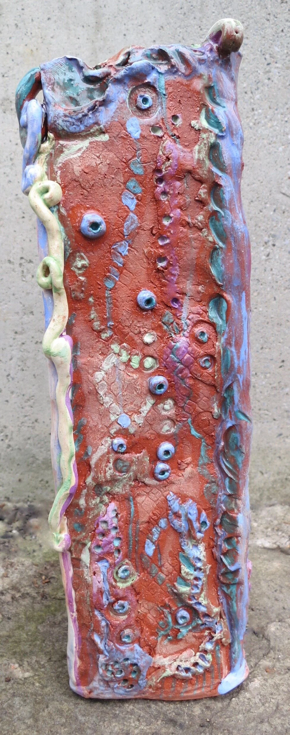 One view of Seafoam memory, a triangular abstract sculpture, 12’’ tall by 4’’ wide