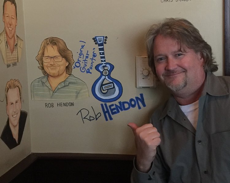  Hendon’s guitar addition to his caricature at the Palm Restaurant, Nashville, TN.  