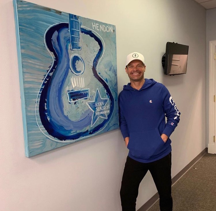  Ryan Seacrest with Hendon’s contribution to the Ryan Seacrest Foundation. 