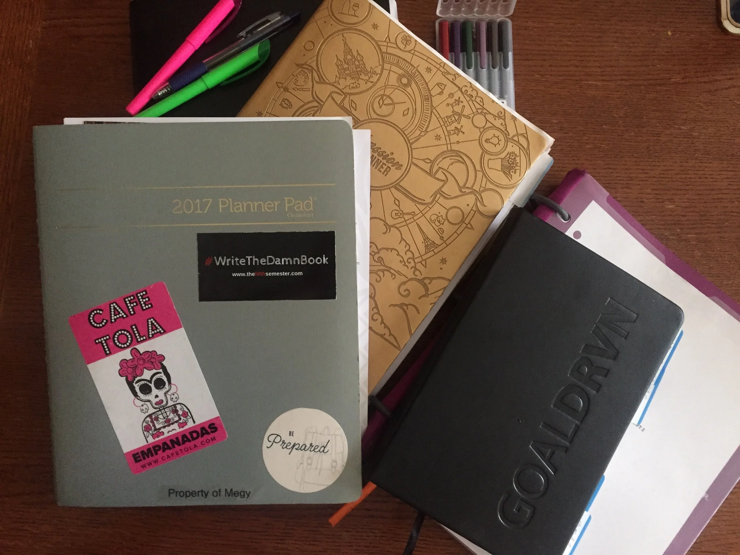 Megy's paper planners overs the years.