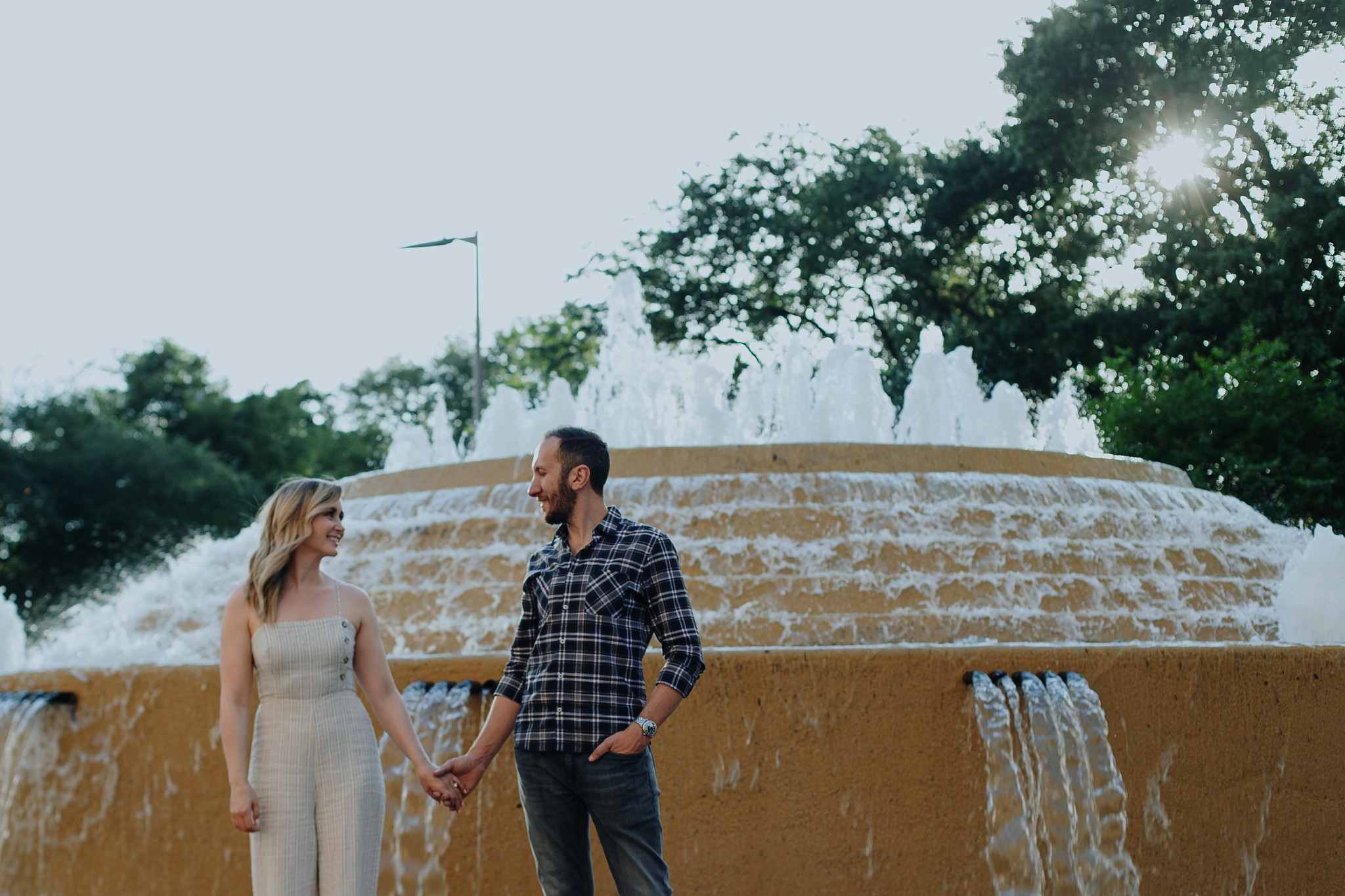 Engagement Photo Session couple by the fountain Downtown Houston, TX