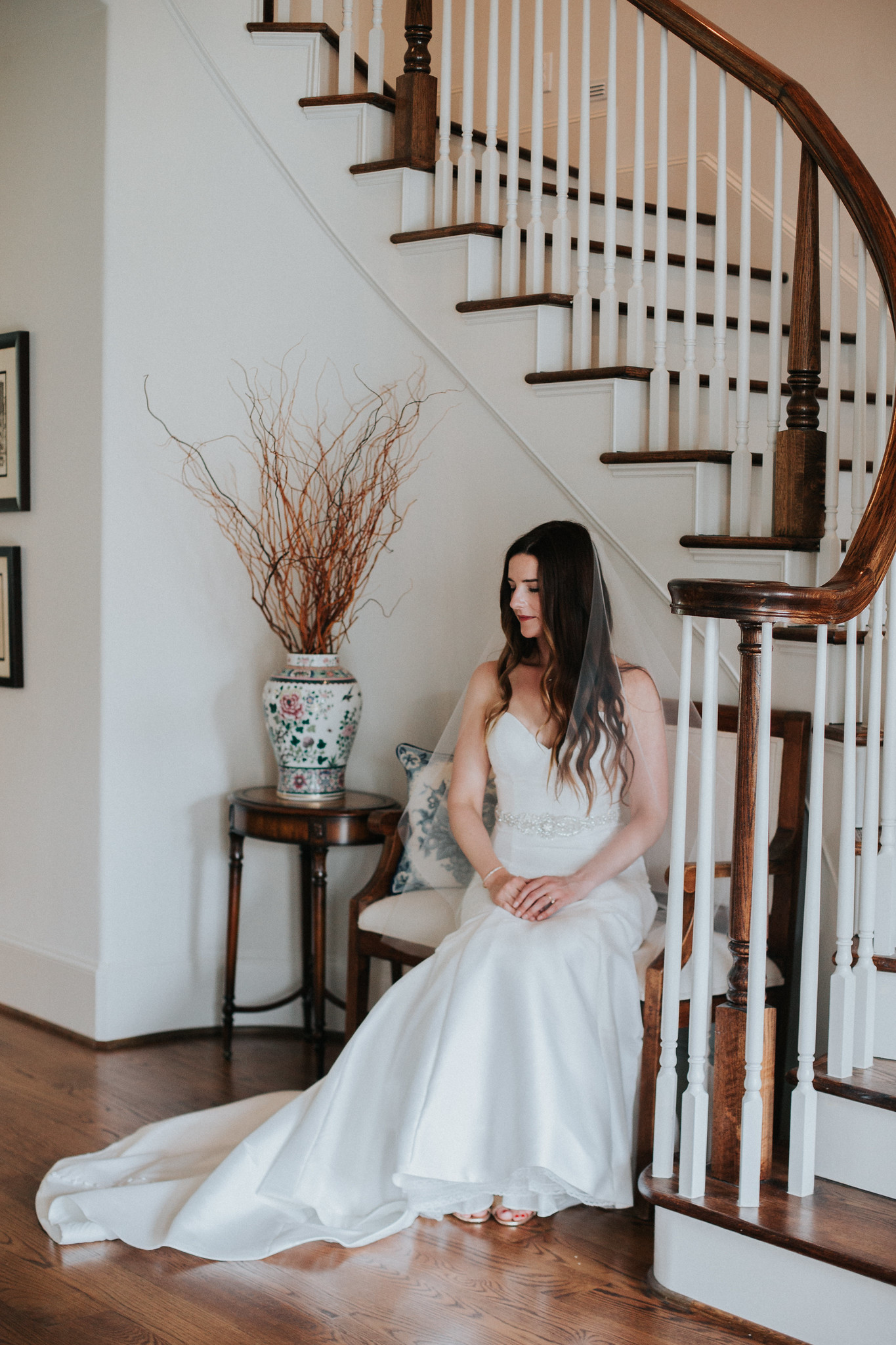 Bride sitting by the stairs Bridal Photo Session at Private House West U Houston, TX