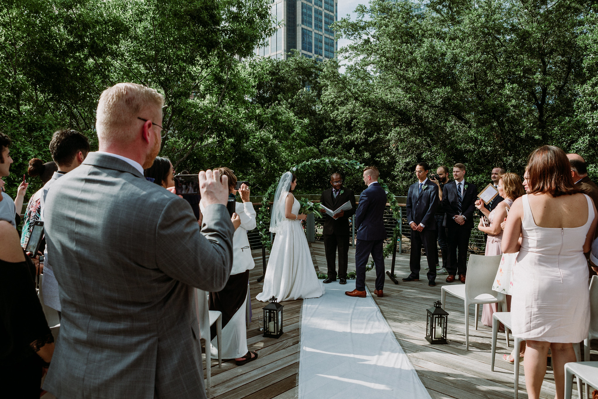 Ceremony. Wedding at The Grove at Discovery Green Park (Houston, TX)