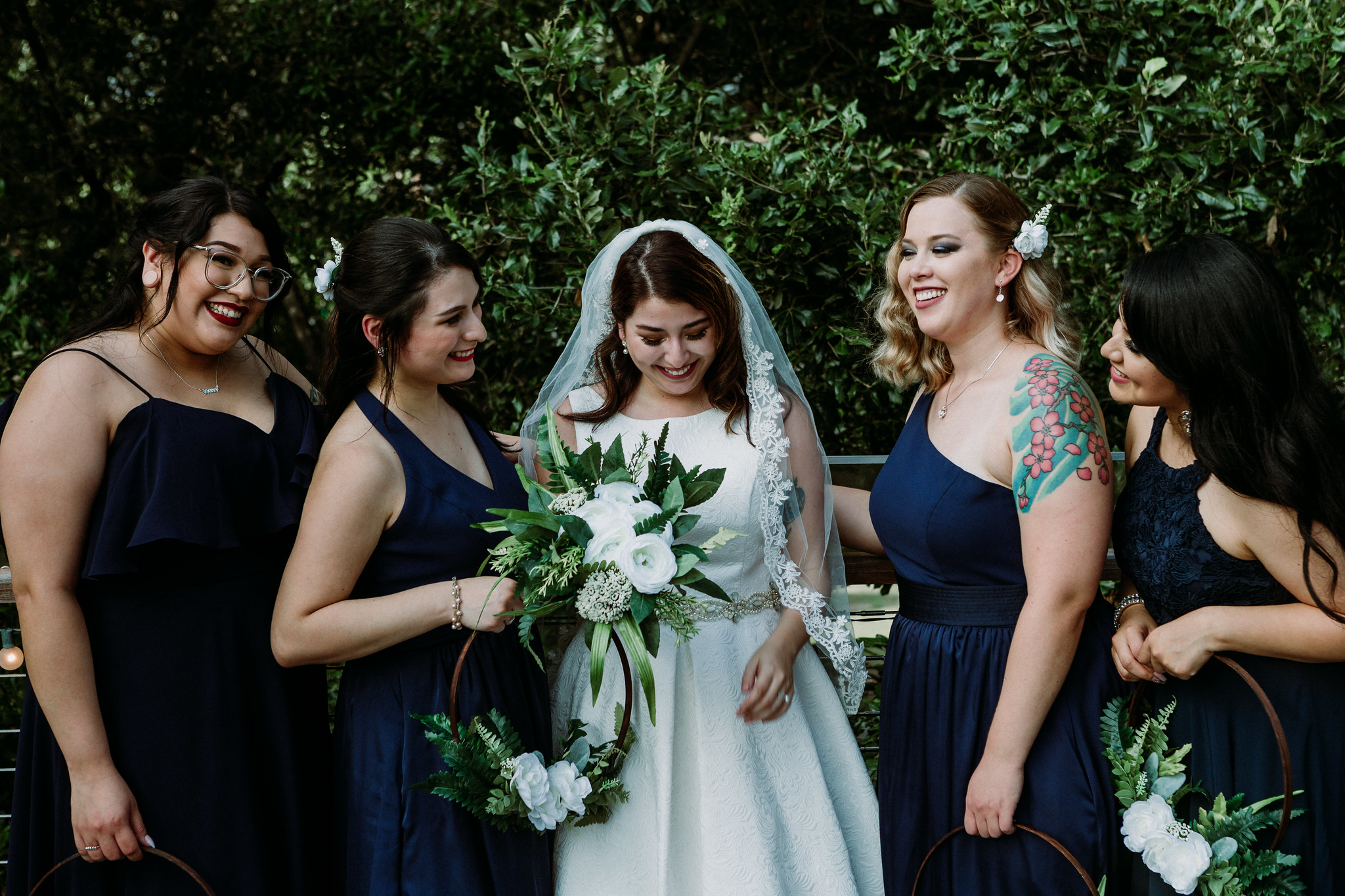 Bride and bridesmaids group portraits. Wedding at The Grove at Discovery Green Park (Houston, TX)