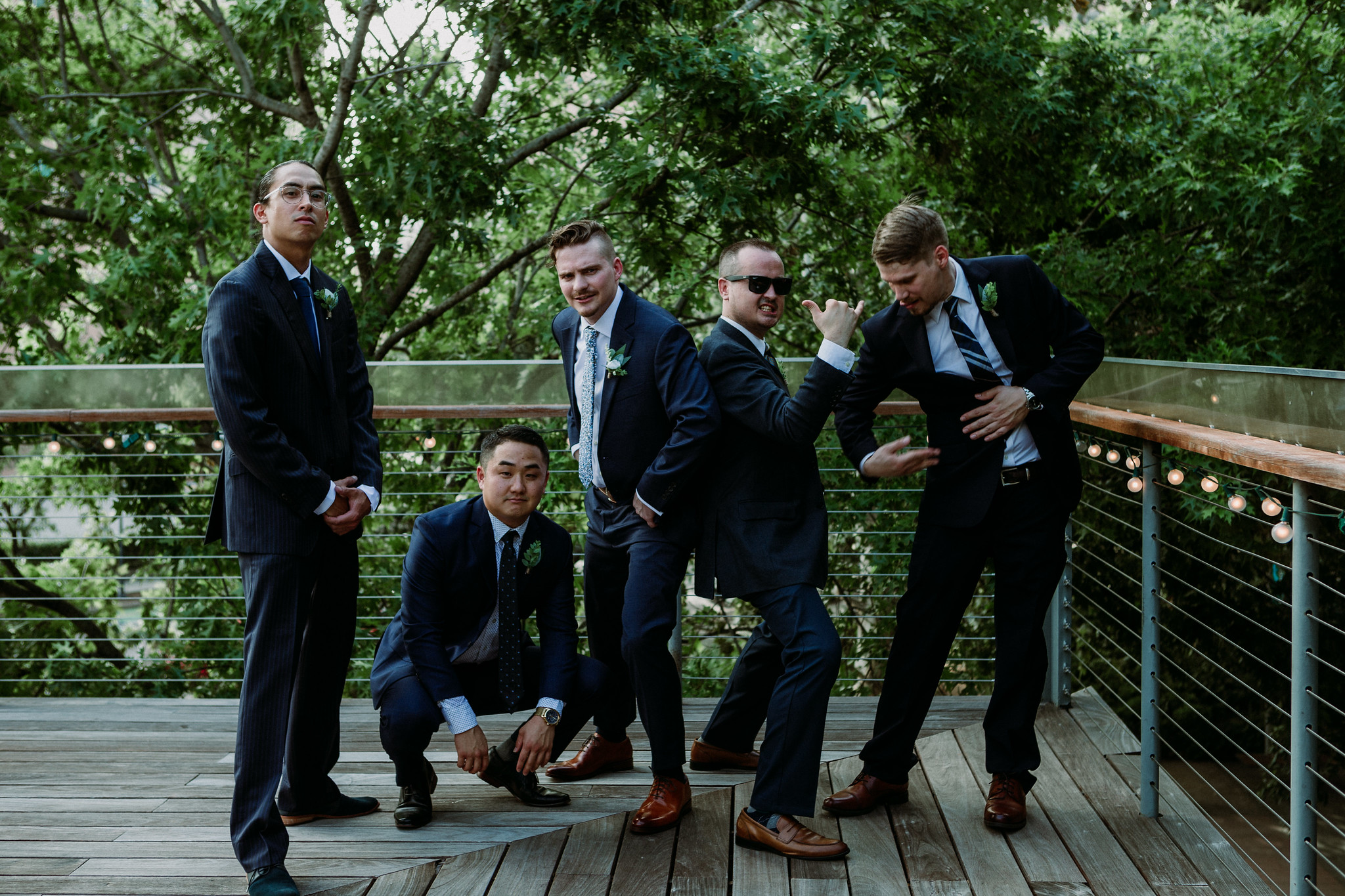 Groom and groomsmen group portraits. Wedding at The Grove at Discovery Green Park (Houston, TX)