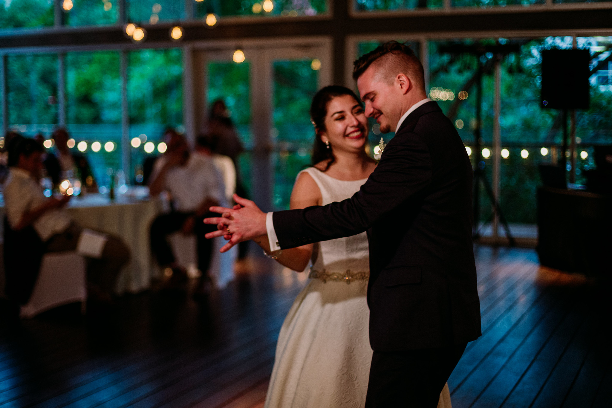 Bride and groom first dance. Reception. Wedding at The Grove at Discovery Green Park (Houston, TX)