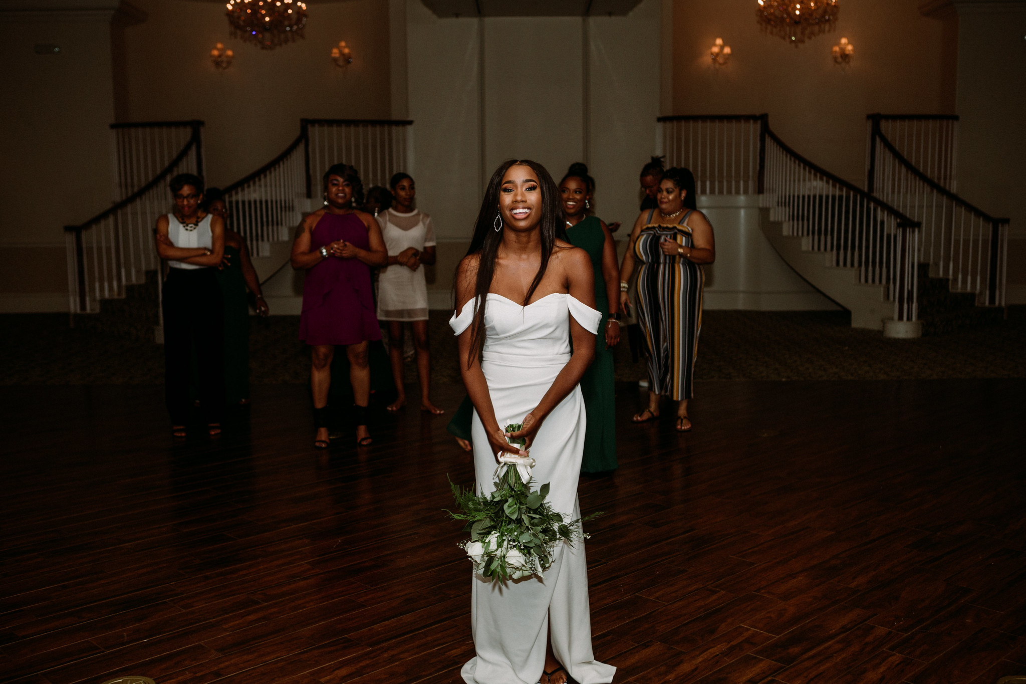 Bouquet toss. Reception. Wedding at Ashton Gardens West (Houston, TX)