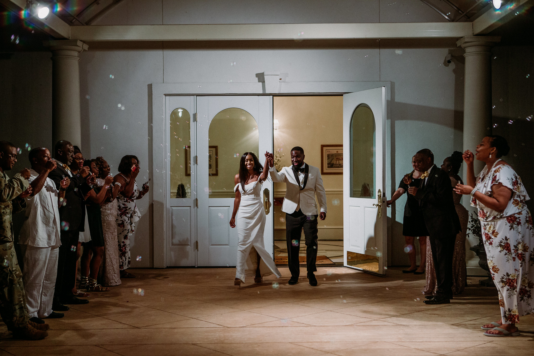 Bride and groom grand exit send off bubbles. Wedding at Ashton Gardens West (Houston, TX)