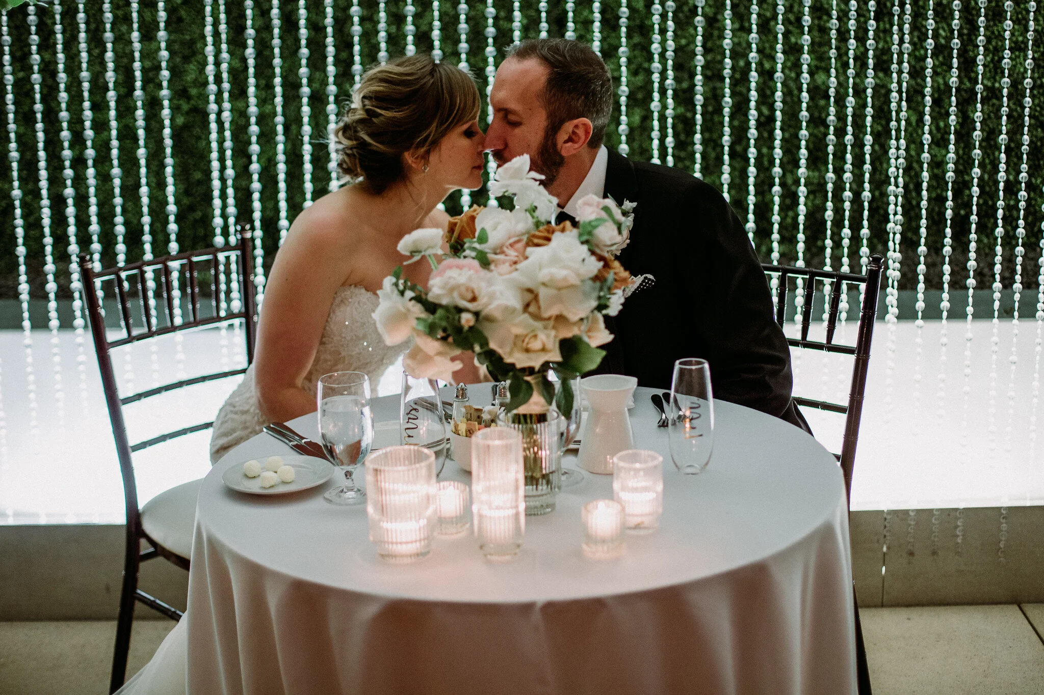 Bride and groom sweetheart table. Reception. Wedding at The Sam Houston Hotel (Houston TX)