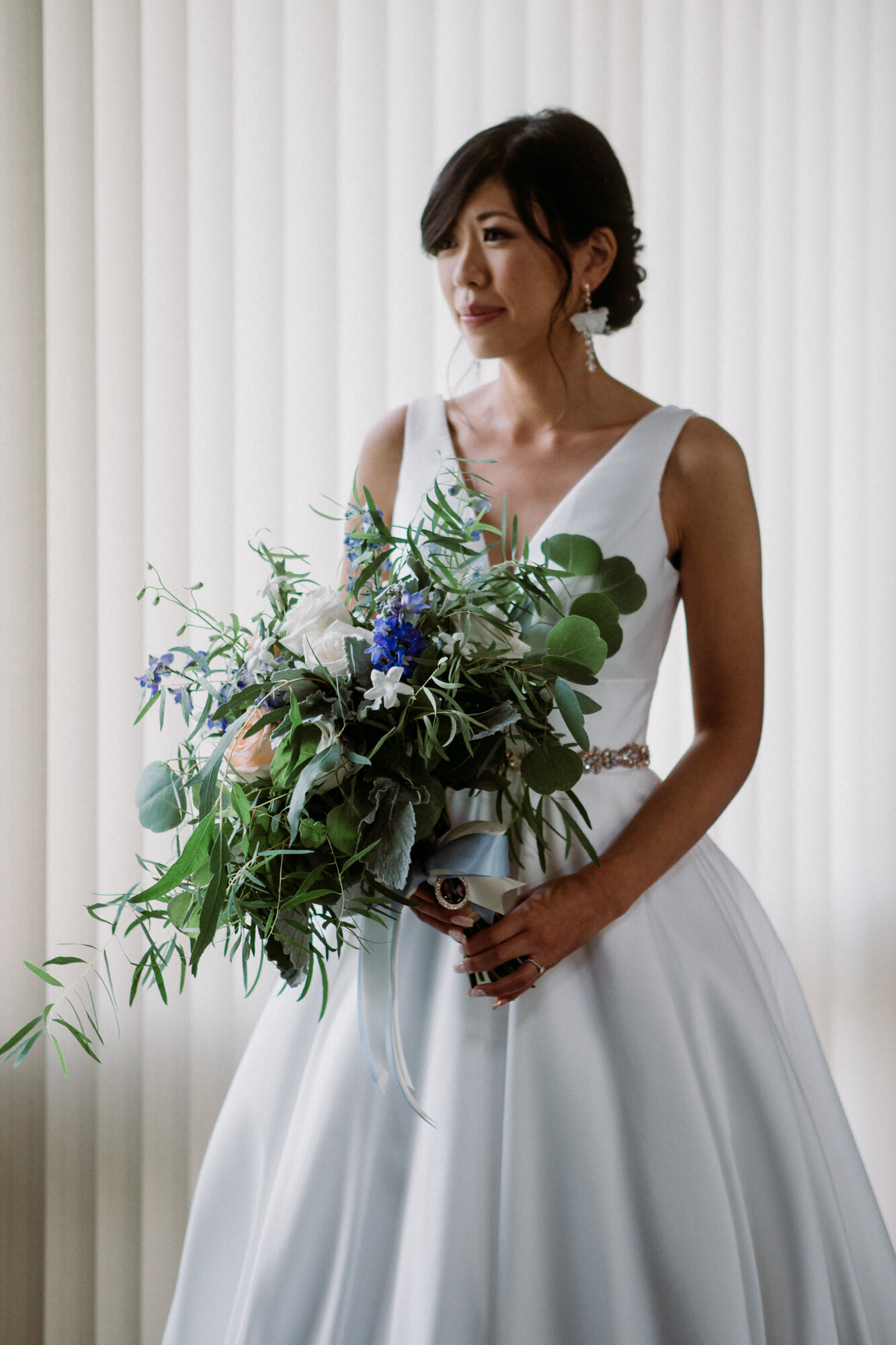 Bride with bouquet. Captivating Micro Wedding Grace Lutheran Church in Brenham, TX