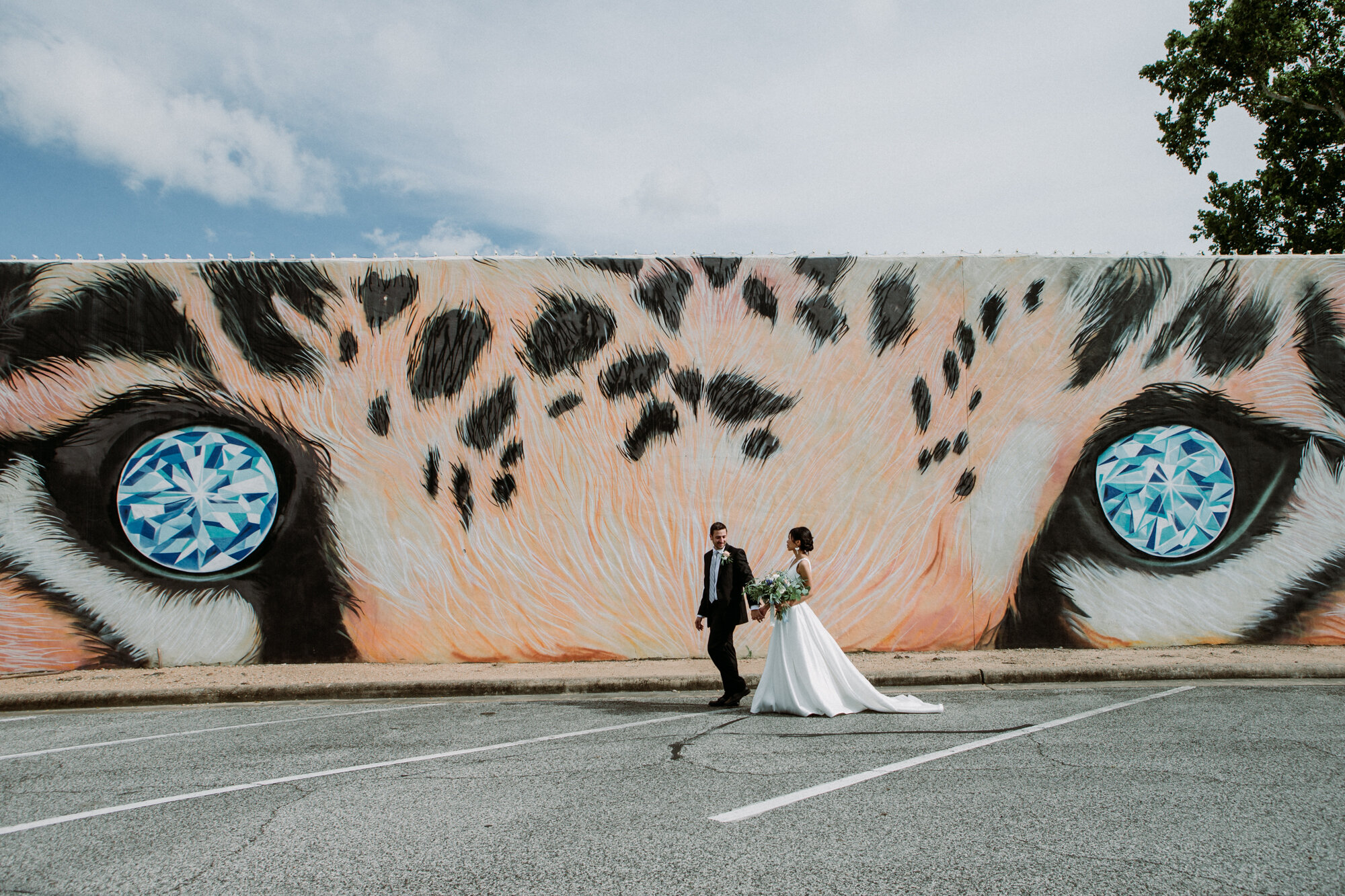 Captivating Micro Wedding Bride and Groom Couples Portraits Murals Tiger's diamond eyes Downtown Brenham, TX