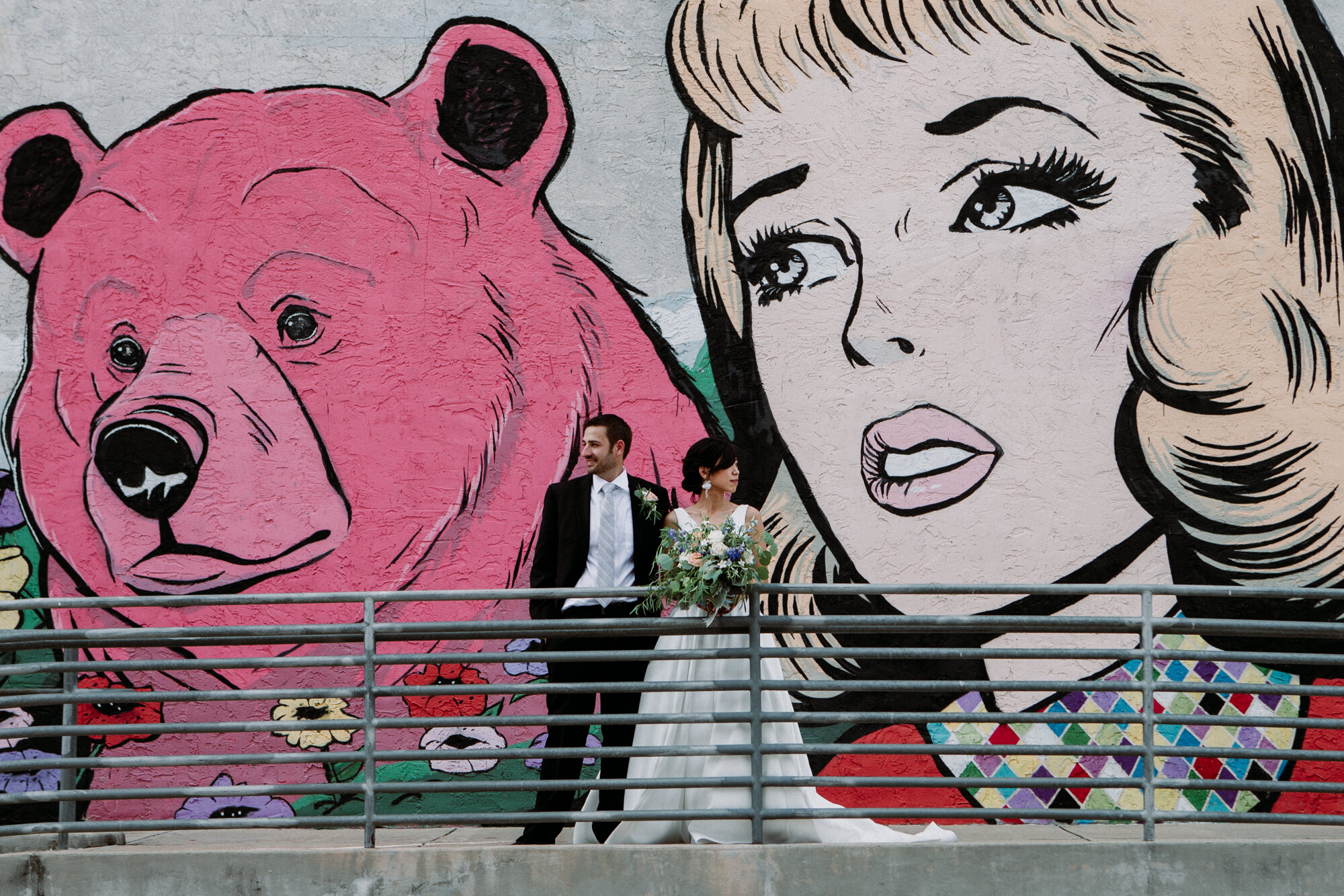 Captivating Micro Wedding Bride and Groom Couples Portraits Murals a Girl and a Bear Downtown Brenham, TX