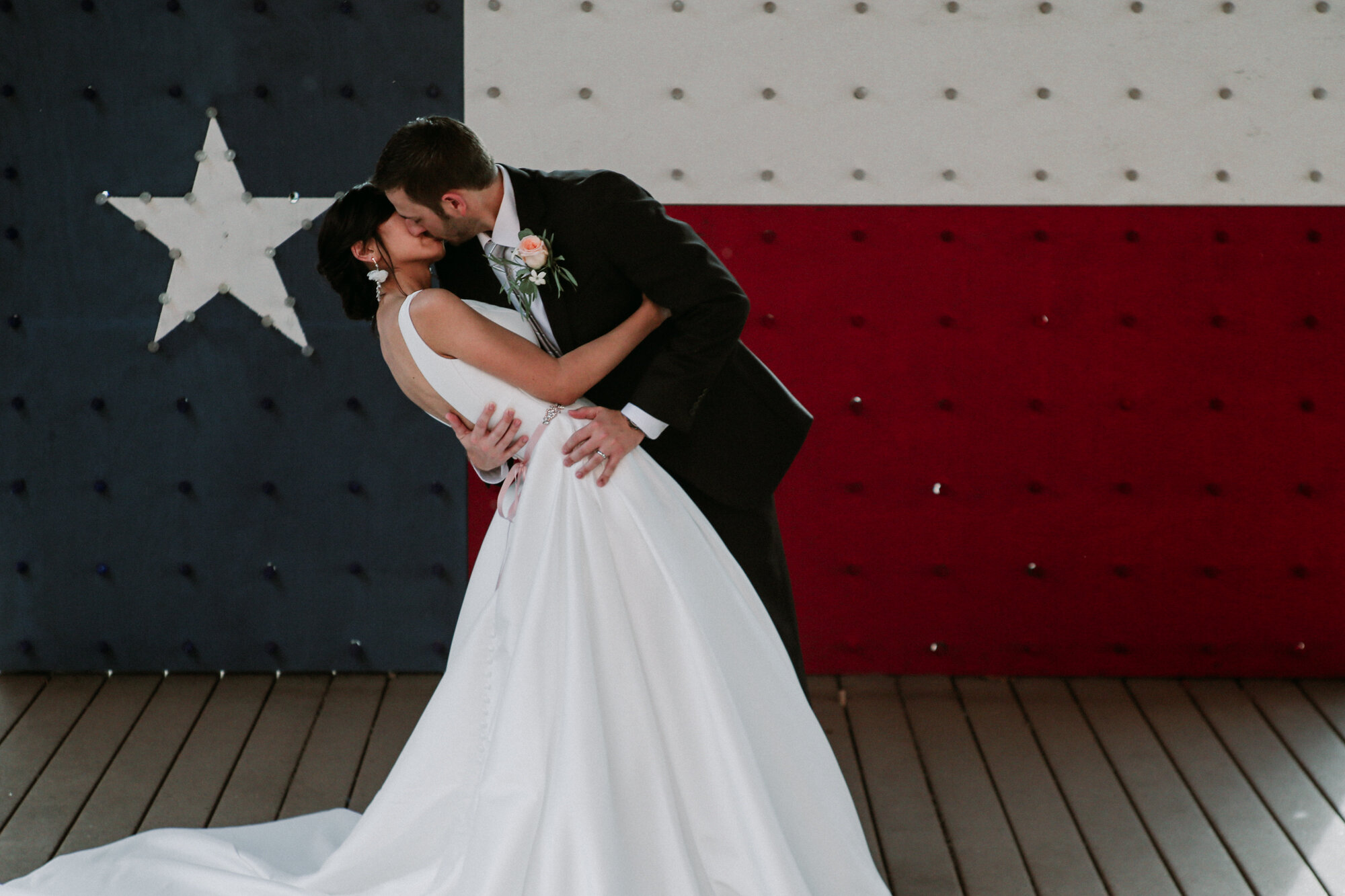 Captivating Micro Wedding Bride and Groom Couples Portraits Texas flag Downtown Brenham, TX